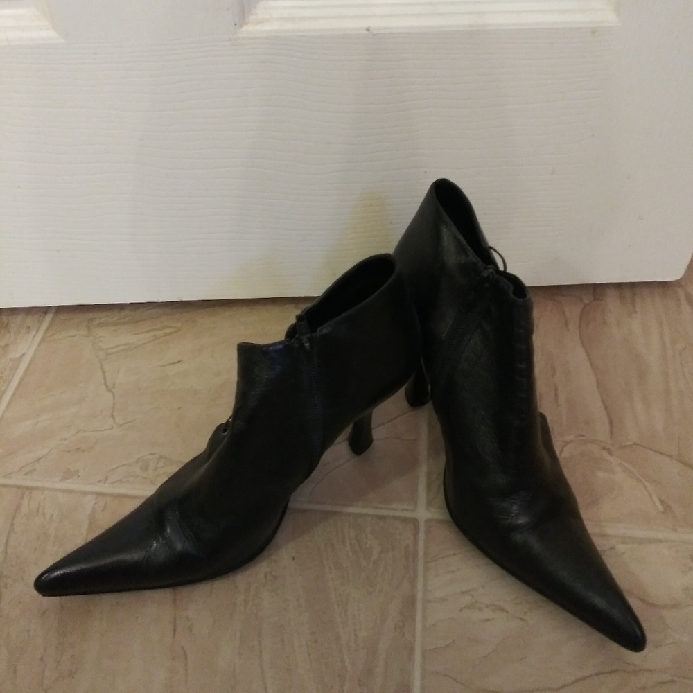black boots with high heels, leather, very chic